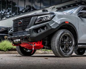 np300 bull bar, front bar, front bumper bar, supreme x-series front bar for Nissan Navara Pro4x with light bar, cube lights, indicator, fog lights, bash plate, recovery points, winch compatible full bumper replacement