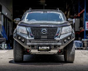 np300 bull bar, front bar, front bumper bar, supreme x-series front bar for Nissan Navara Pro4x with light bar, cube lights, indicator, fog lights, bash plate, recovery points, winch compatible full bumper replacement