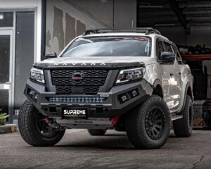 np300 bull bar, front bar, front bumper bar, supreme x-series front bar for Nissan Navara Pro4x with light bar, cube lights, indicator, fog lights, bash plate, recovery points, winch compatible full bumper replacement