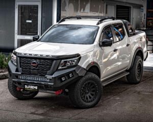 np300 bull bar, front bar, front bumper bar, supreme x-series front bar for Nissan Navara Pro4x with light bar, cube lights, indicator, fog lights, bash plate, recovery points, winch compatible full bumper replacement