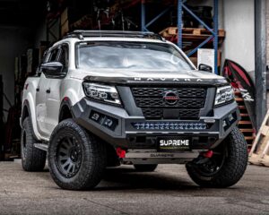 np300 bull bar, front bar, front bumper bar, supreme x-series front bar for Nissan Navara Pro4x with light bar, cube lights, indicator, fog lights, bash plate, recovery points, winch compatible full bumper replacement