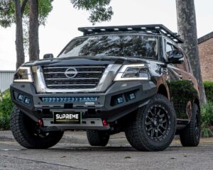 patrol bull bar, front bar, front bumper bar, supreme x-series front bar for Nissan Patrol Y62 Series 5 with light bar, cube lights, indicator, fog lights, bash plate, recovery points, winch compatible full bumper replacement