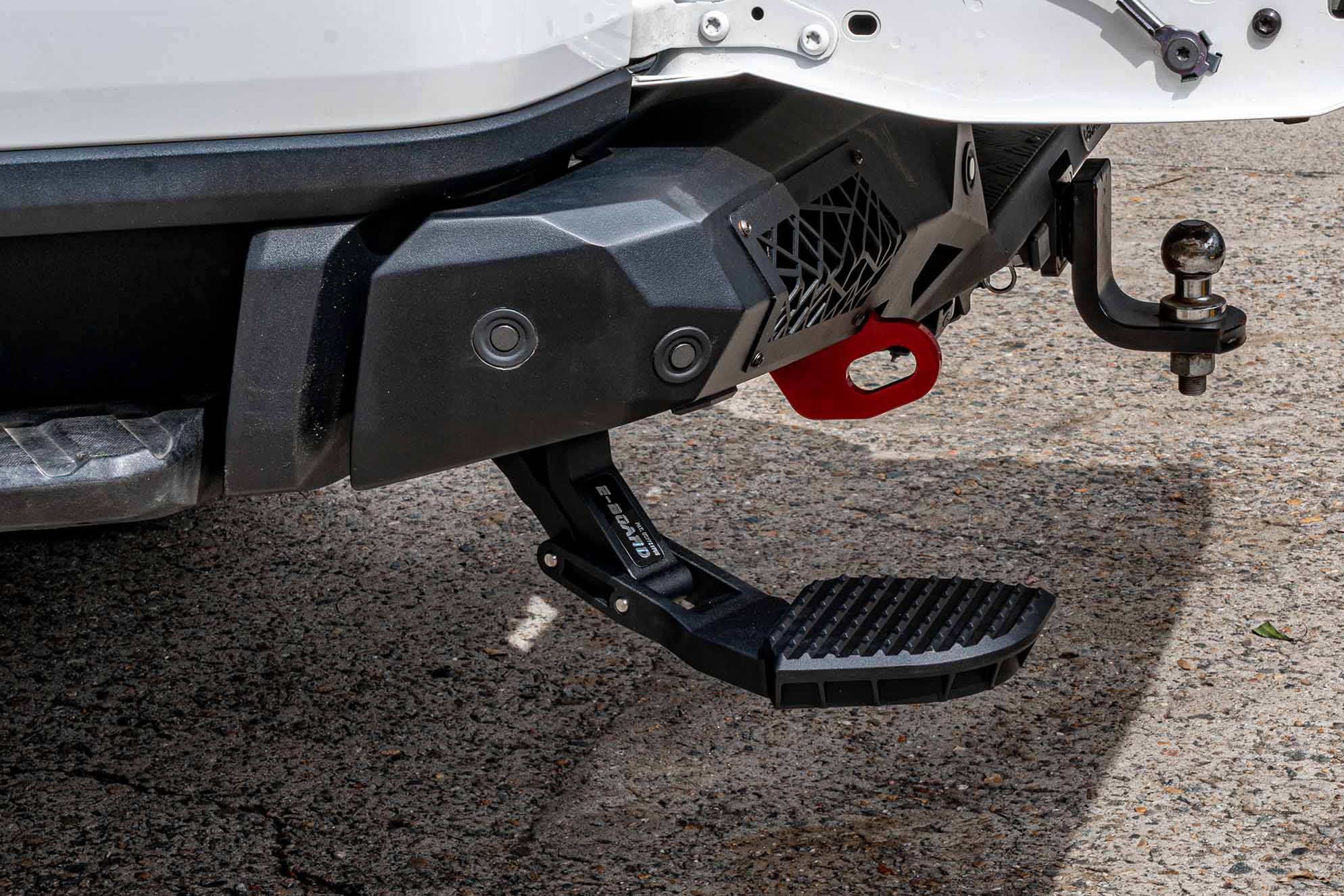 Supreme Electric Rear Step deployed for maximum stability, emphasizing heavy-duty safety and reliable tub access