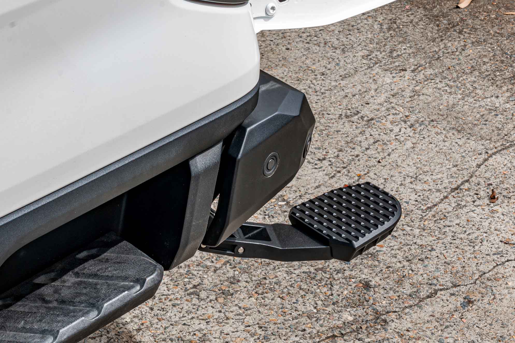 Supreme Electric Rear Step deployed, offering superior, lower access next to the factory bumper step on a Ford Ranger